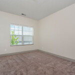 Large carpeted bedroom